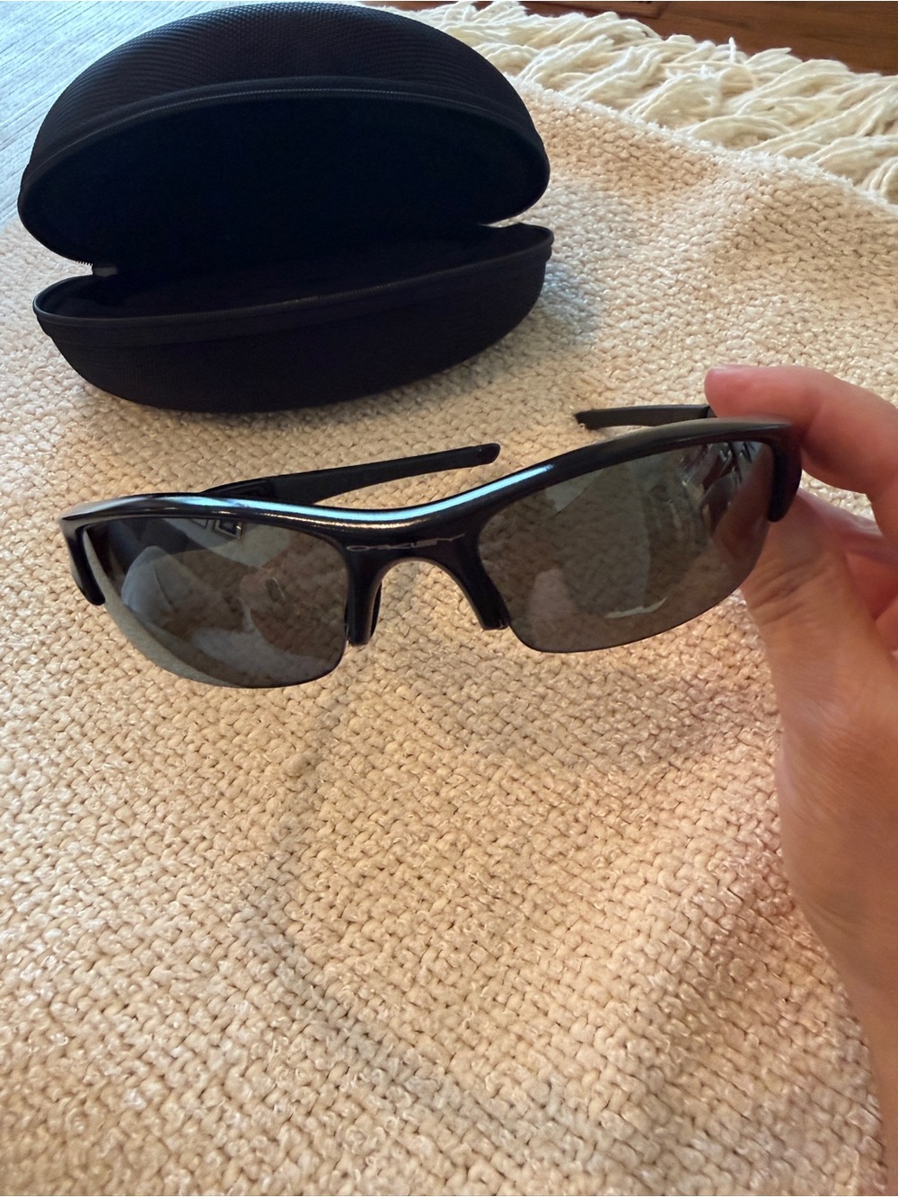Oakley Black Frame Sunglasses with Gray Lenses